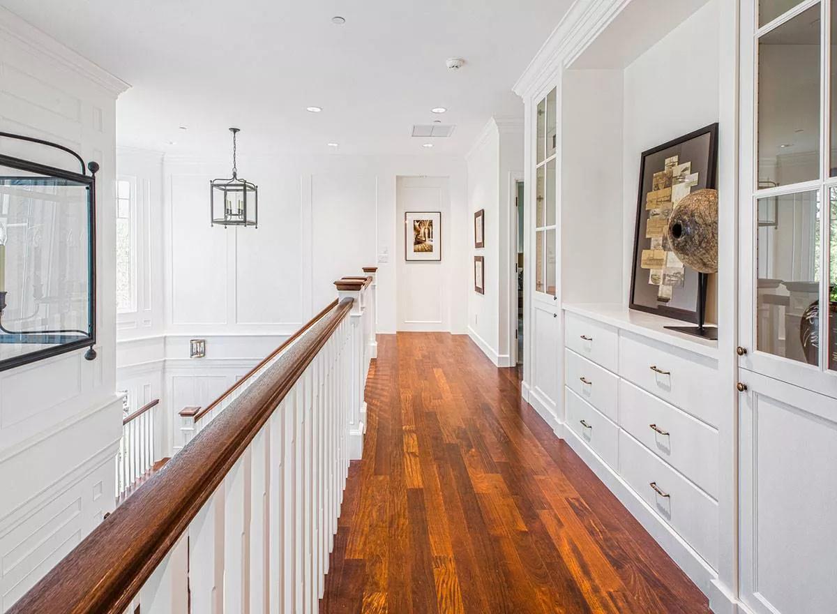 Notice the Craftsmanship in This Hallway With Beautiful Built-Ins