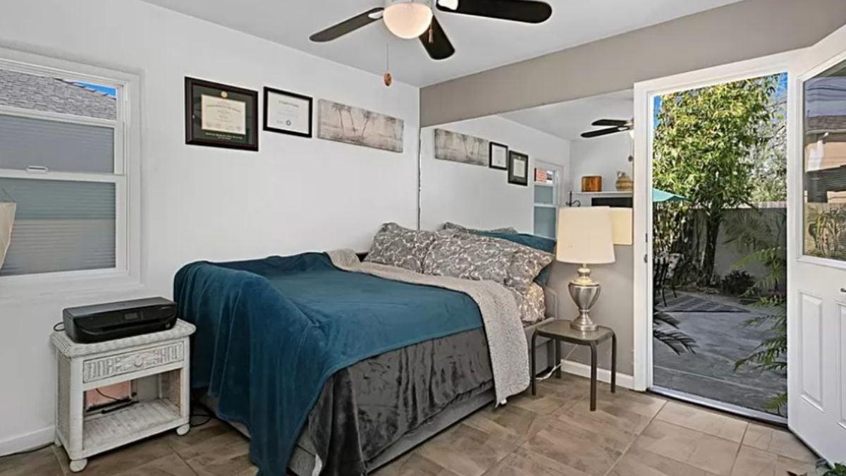 Compact Bedroom with Clever Space Amplifying Mirror