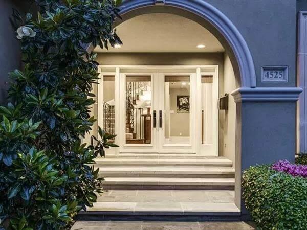 Elegant Entryway Framed by an Arched Portico