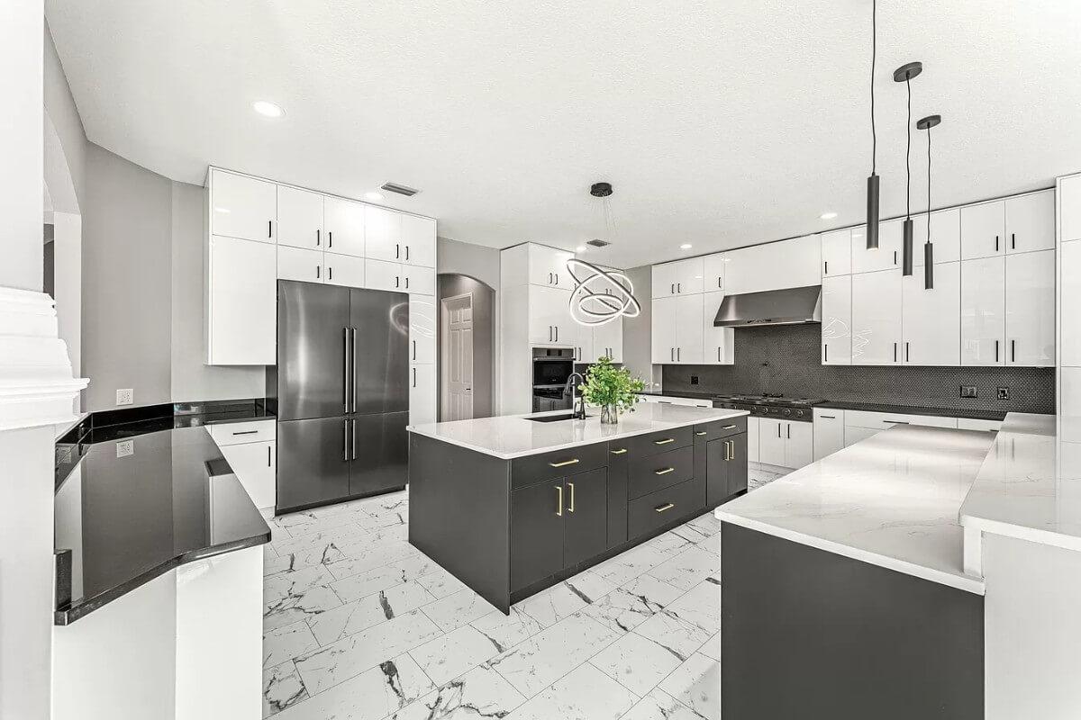 Sleek Kitchen with Striking Two-Tone Cabinets and Central Island