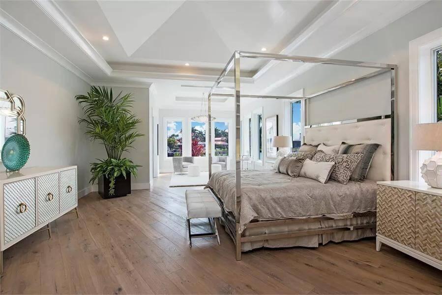 Luxurious Master Suite with a Sleek Four-Poster Bed