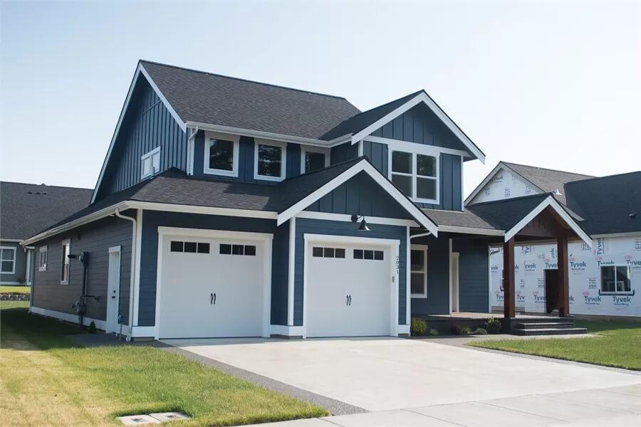 Admire the Crisp Lines of This Two-Car Garage on a Classic Craftsman Home