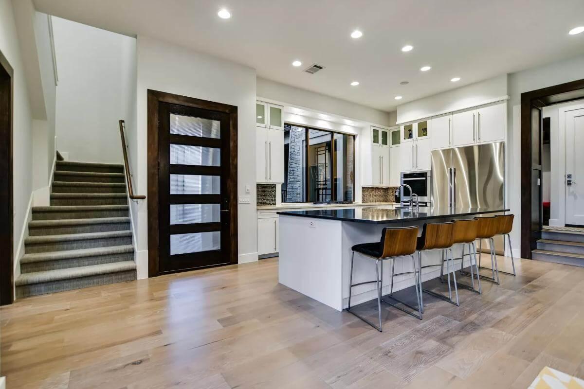 Notice the Dramatic Contrast in This Sleek Kitchen Design