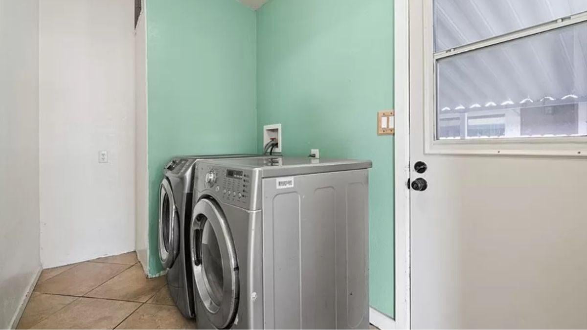 Efficient Laundry Room with a Splash of Color