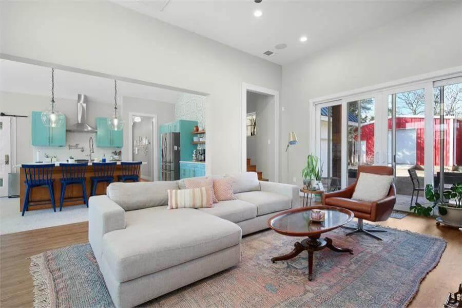 Bold Turquoise Cabinets Steal the Show in This Open Living Area