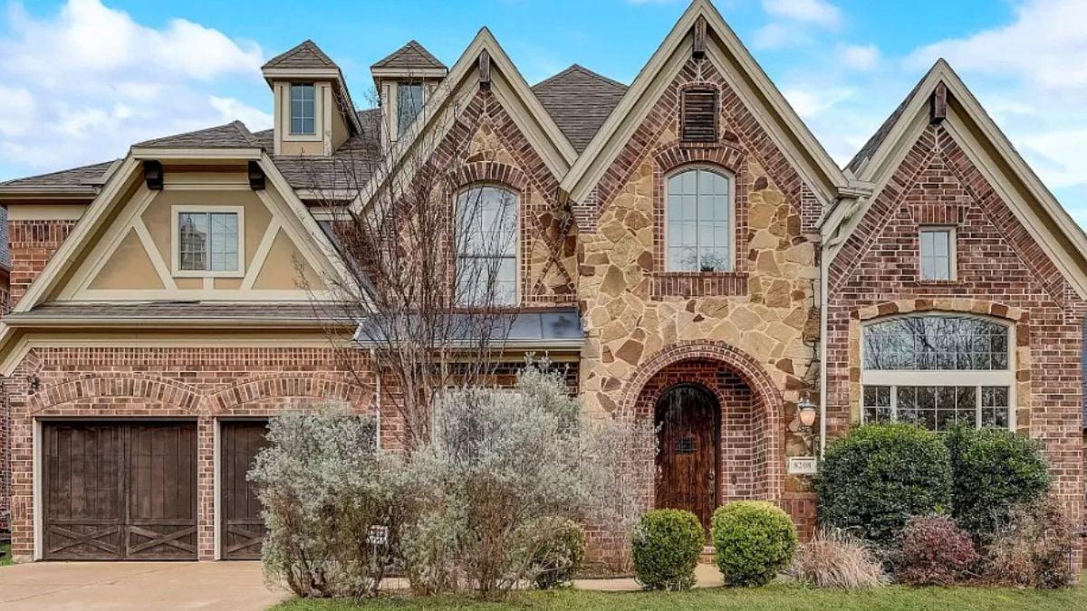 Appreciate the Intricate Gable Design and Rustic Wooden Door