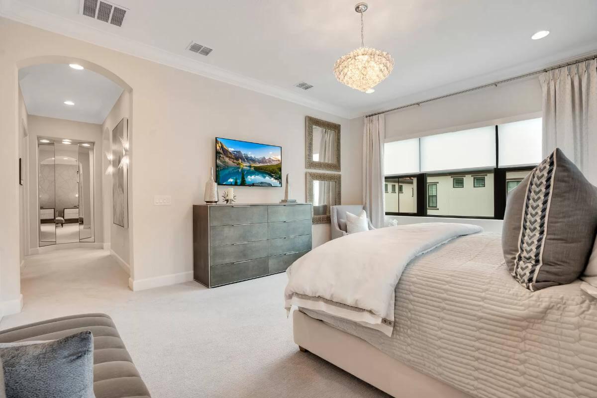 Check Out That Statement Chandelier in This Serene Bedroom
