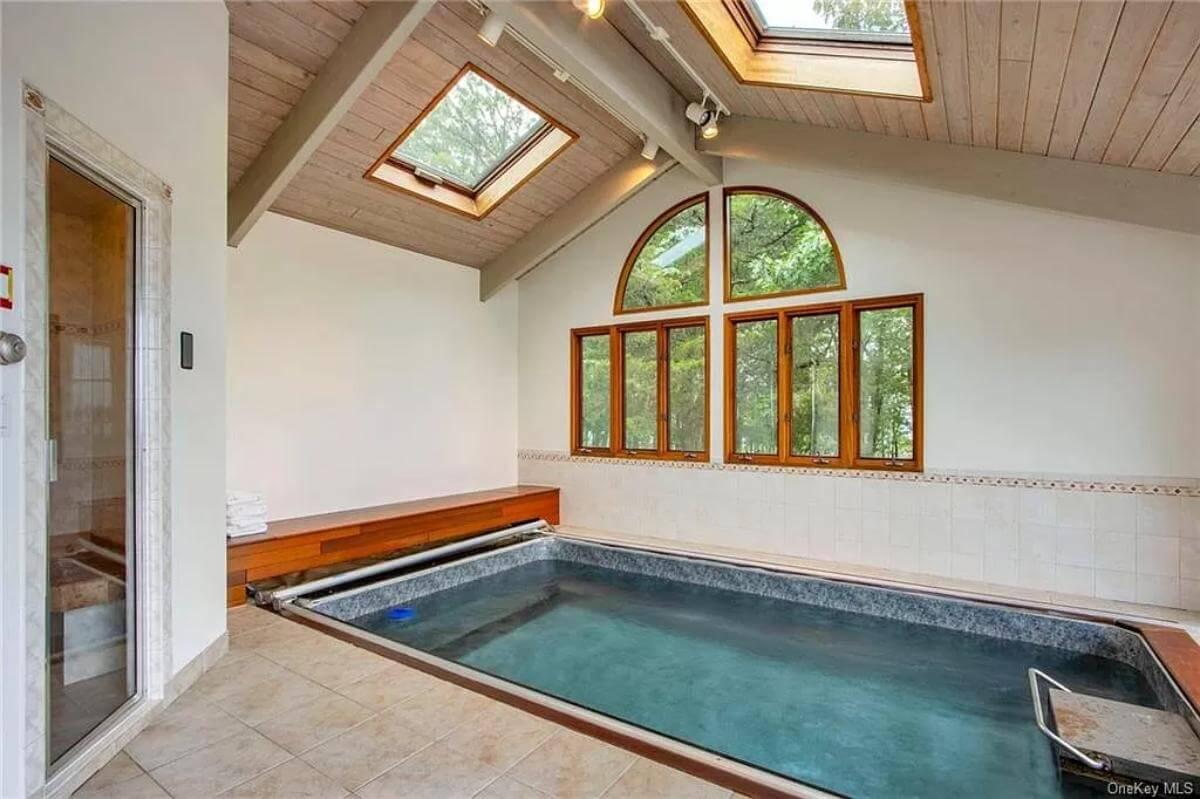 Wow, Check Out the Skylights Illuminating This Indoor Pool Retreat