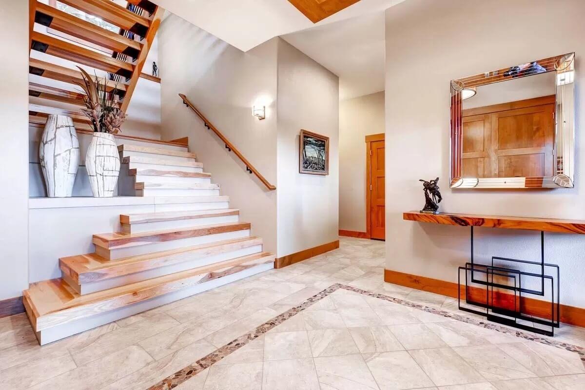 Explore the Striking Wood and Open Design of This Stairway