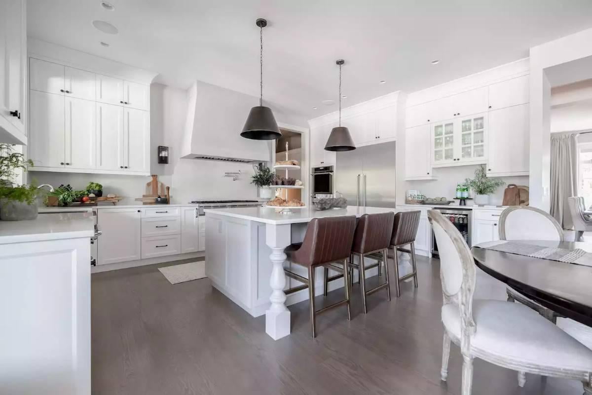 Look at the Gorgeous Island and Pendant Lighting in This Sleek Kitchen