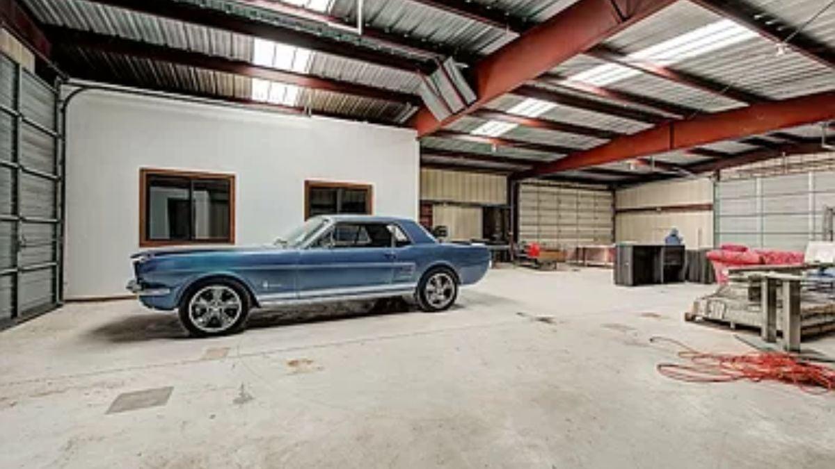 Explore the Industrial Feel of This Expansive Garage Workshop