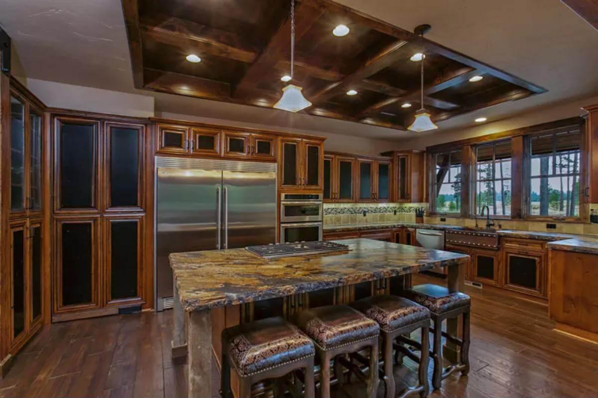 Notice the Granite Countertops and Classic Craftsman Details in This Spacious Kitchen