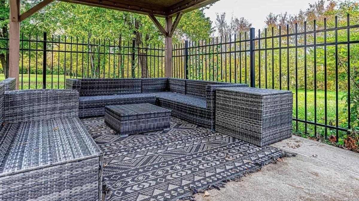 Cozy Outdoor Haven With Woven Seating Under a Pergola