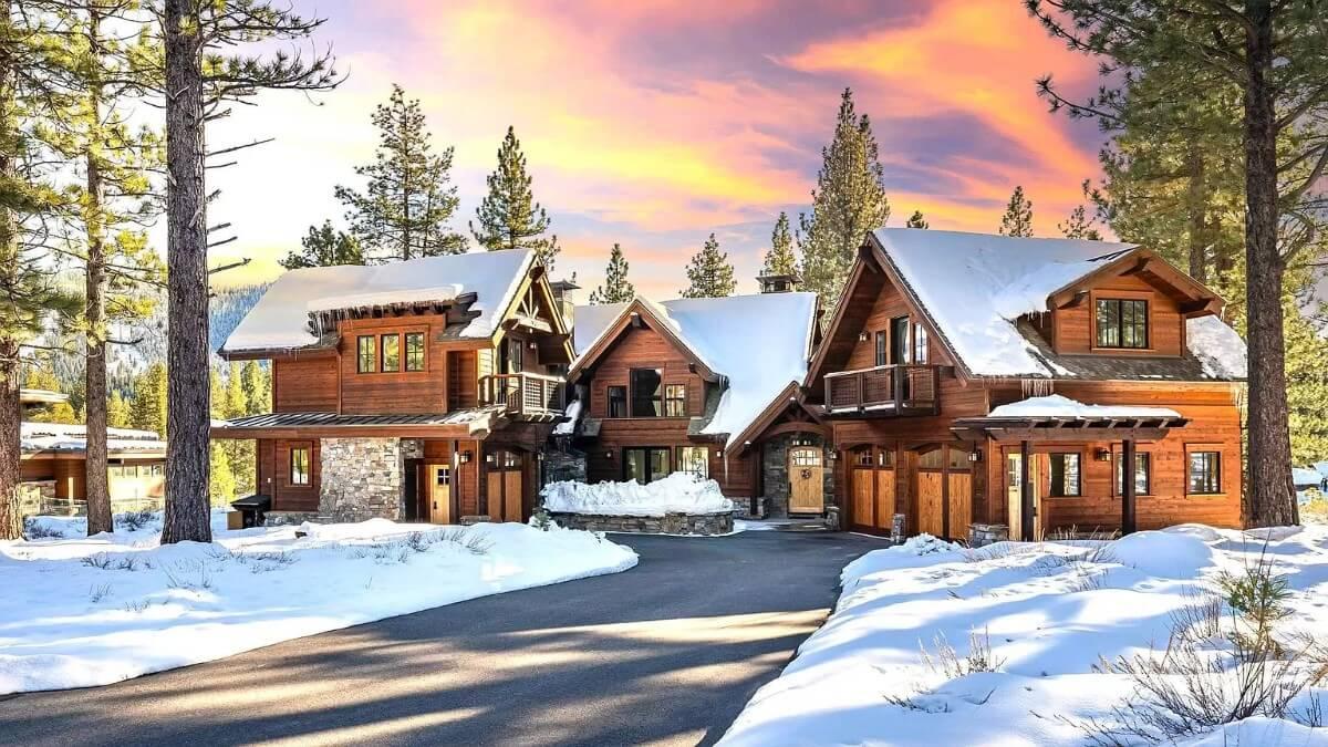 Rustic Mountain Retreat with Stunning Timber Accents and Snow-Capped Roofs