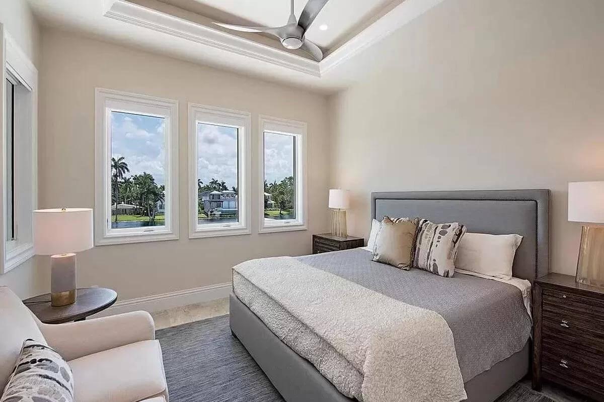 Peaceful Bedroom with a Simple Modern TwistโNotice the Ceiling Fan