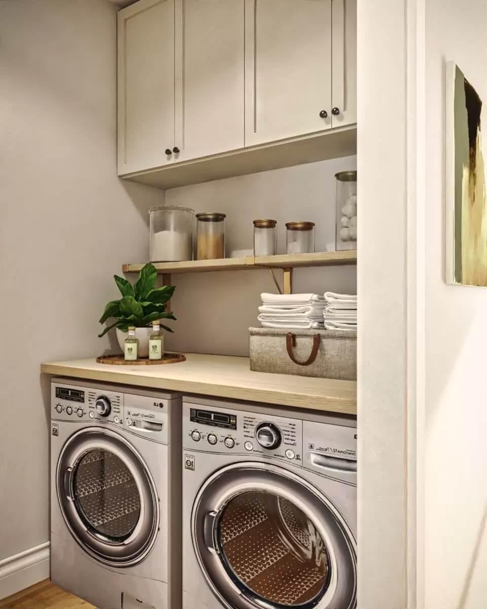 Functional Laundry Room With Sleek Appliances and Thoughtful Storage