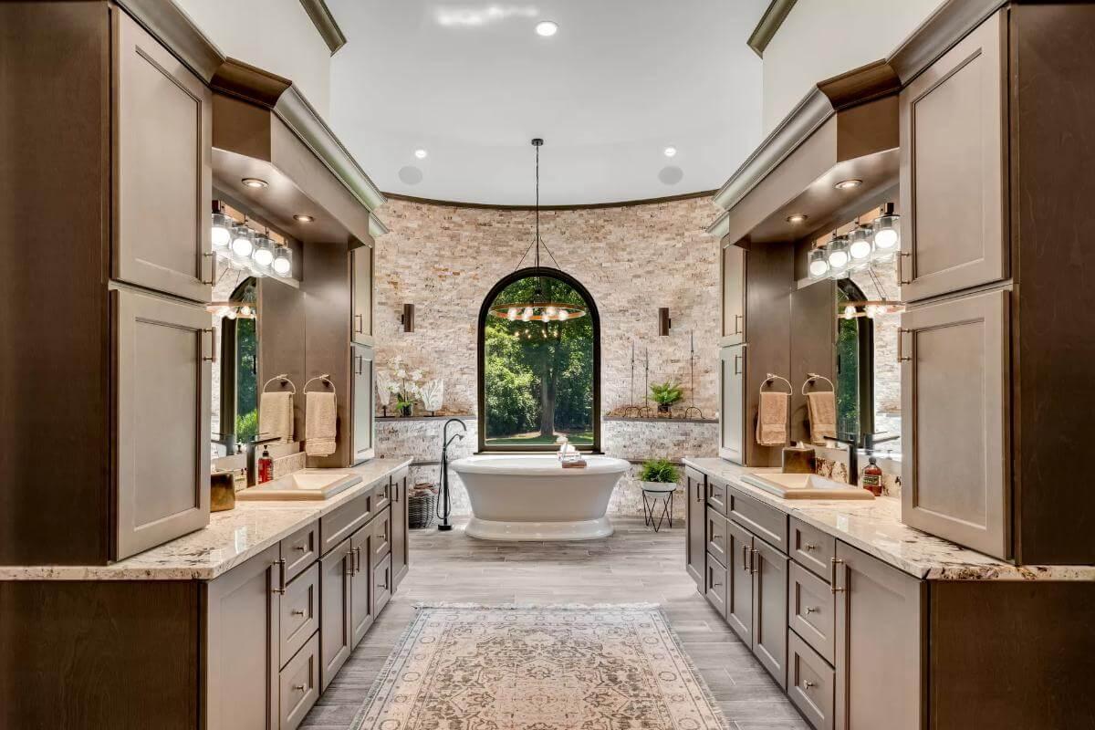 Step Into This Spa-Like Bathroom with a Freestanding Tub Framed by an Arched Window