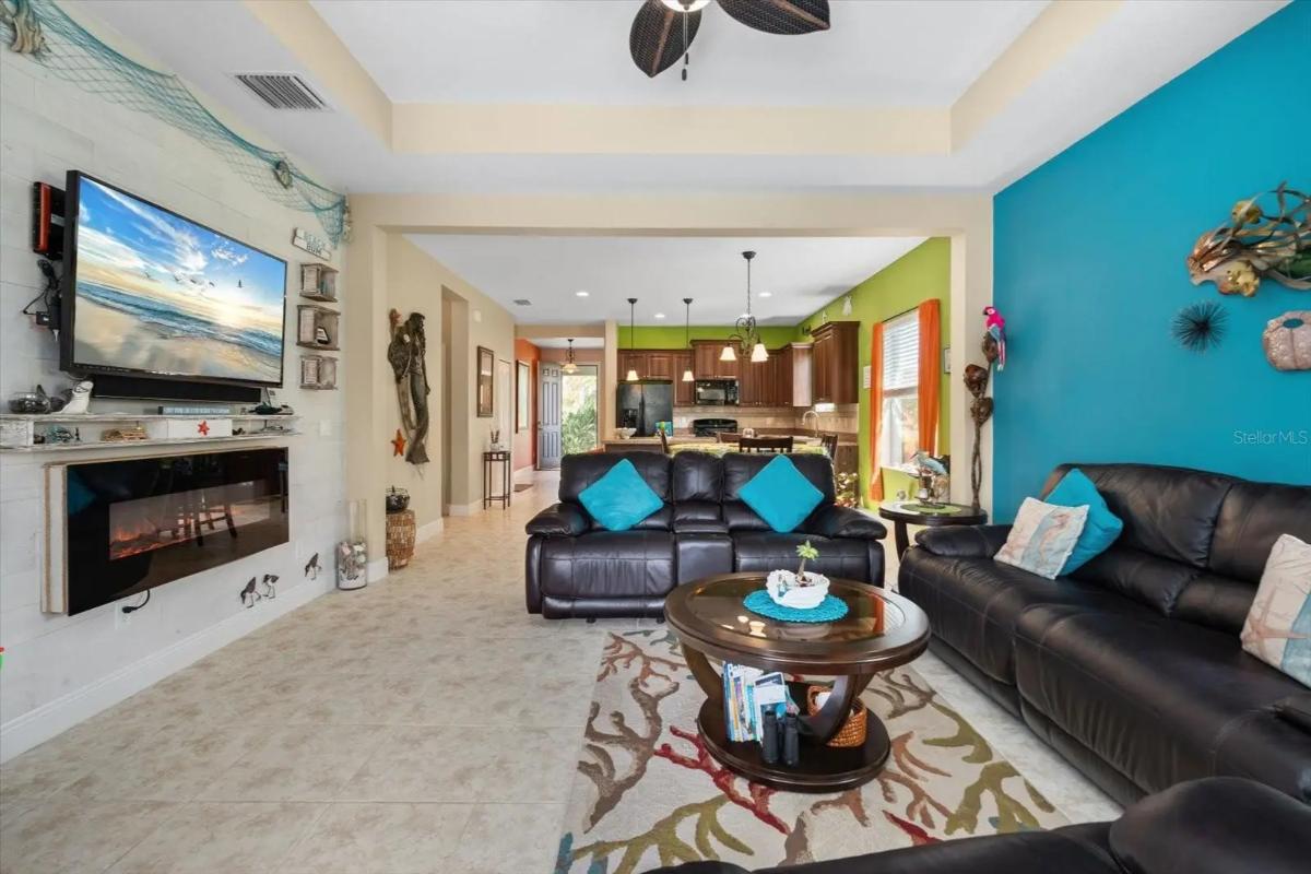 Contemporary 3-Bedroom Florida Home with Front Porch and Screened-in Pool (1,805 Sq. Ft. Floor Plan)