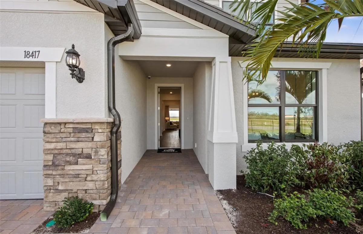 Contemporary 5-Bedroom Coastal Home with Open-Concept Living and 3-Car Garage (3,415 Sq. Ft. Floor Plan)