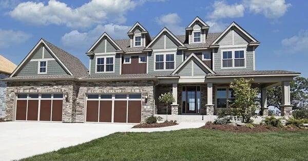 Traditional Craftsman Facade with Expansive Three-Car Garage