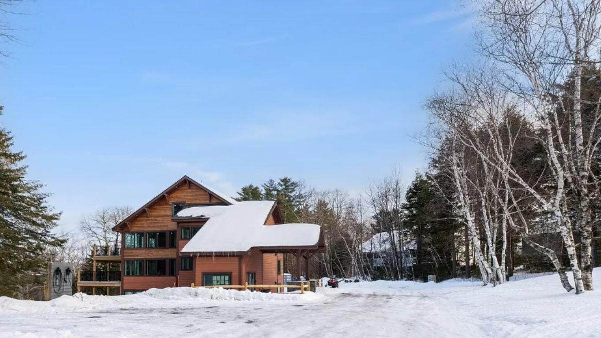 Rustic Winter Retreat with a Snow-Capped Roof