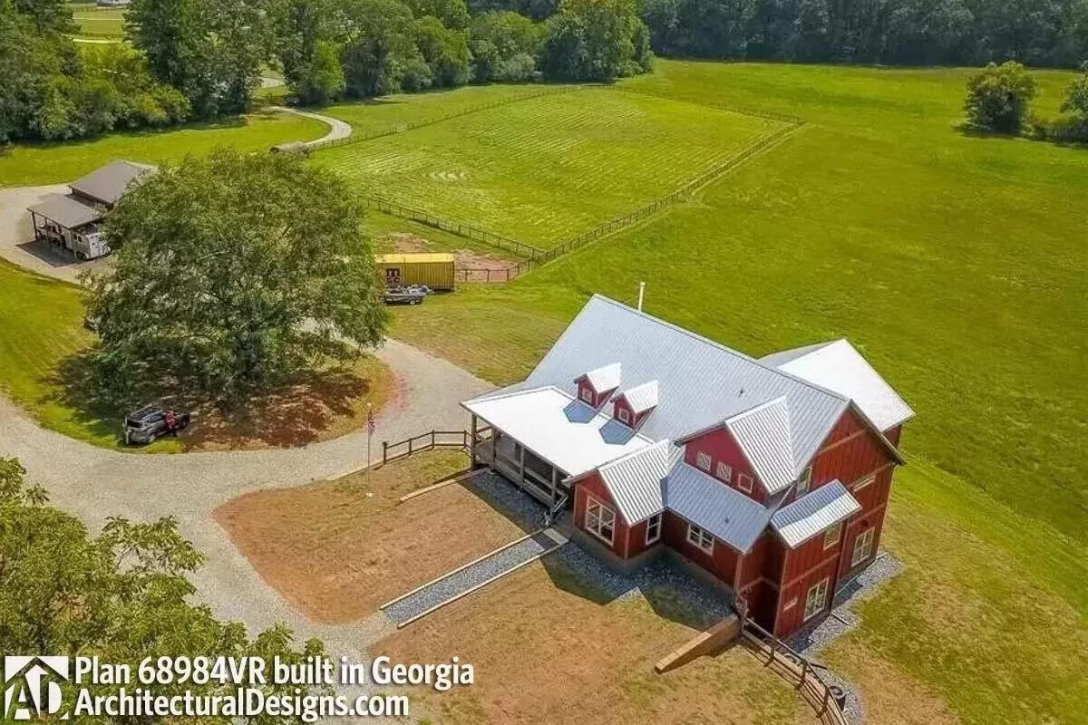 Gaze Over the Idyllic Countryside Surrounding This Red Farmhouse