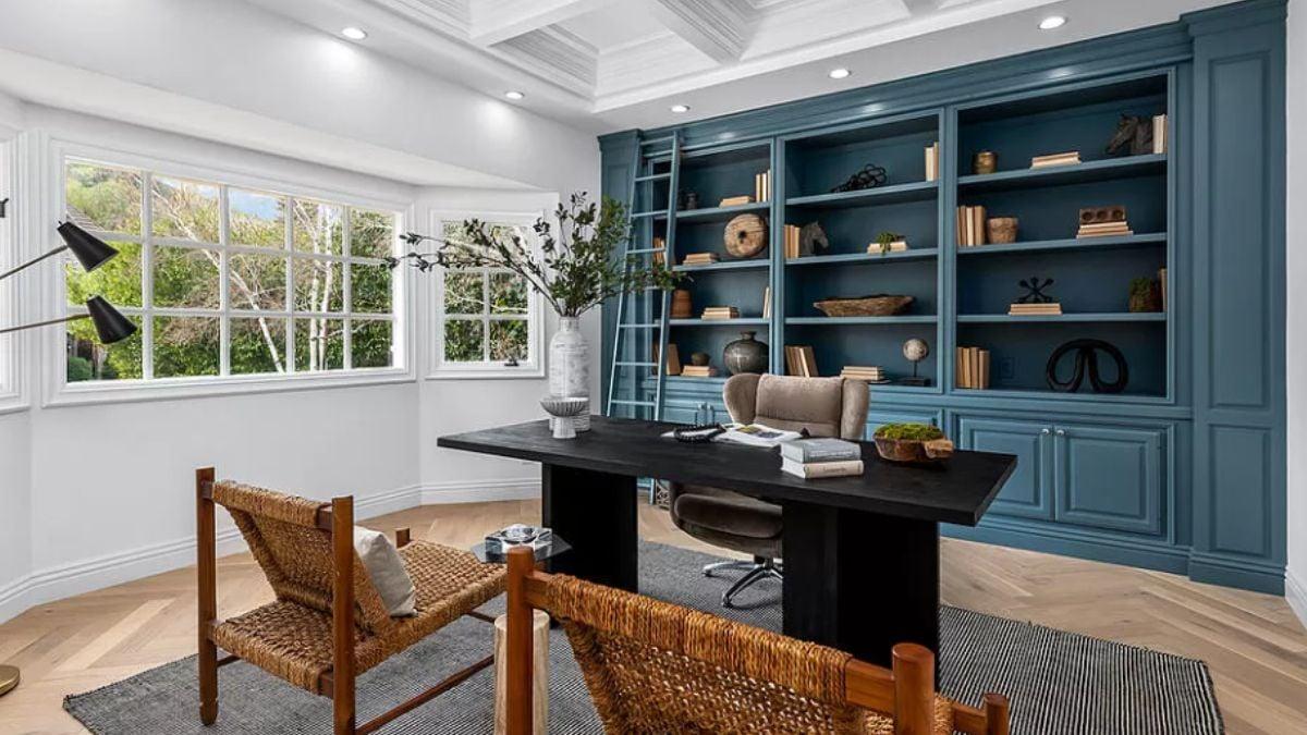 Spot the Rich Blue Bookcase in This Bright Home Office