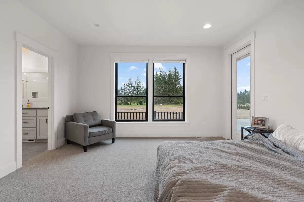 Notice the Large Windows Transforming This Simple Bedroom