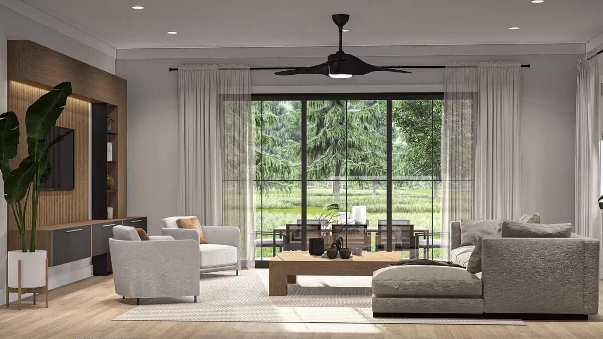 Step Inside This Living Room with Expansive Views and Chic Ceiling Fan