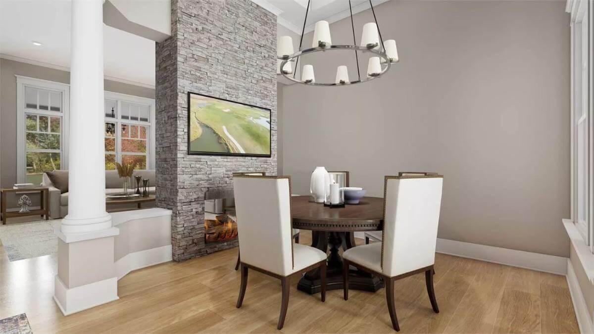 Cozy Dining Nook Highlighting a Stunning Stone Fireplace