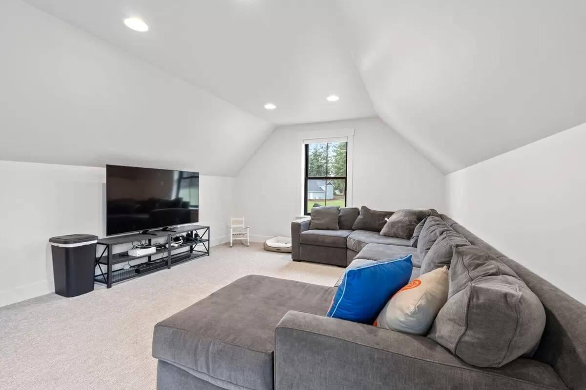 Explore the Versatility of This Loft Media Room