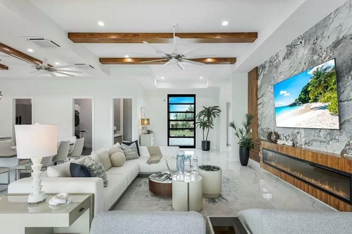 Striking Living Space with Wooden Beams and Marble Accents