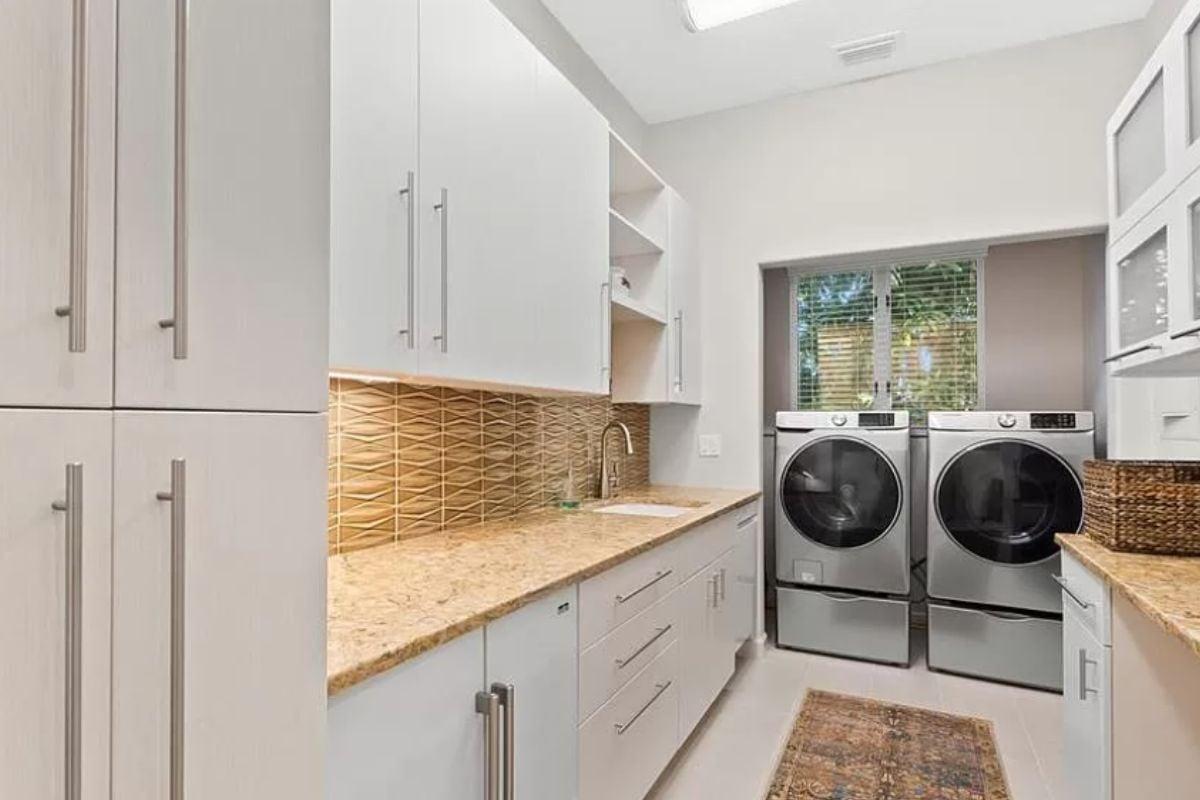 Check Out the Patterned Backsplash in This Modern Laundry Room