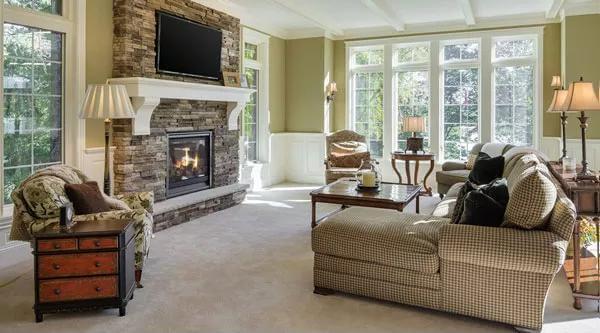 This Spacious Living Room With Large Windows Ushers in Natural Light