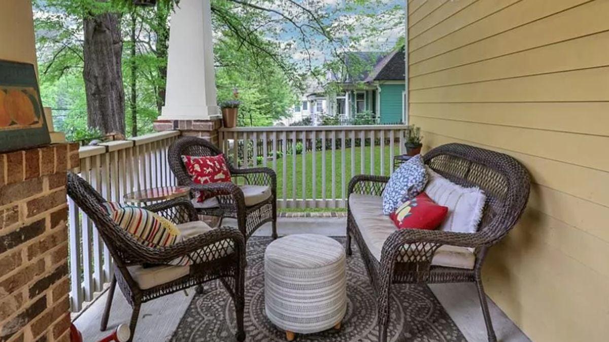 Charming Craftsman Porch with Inviting Wicker Seating