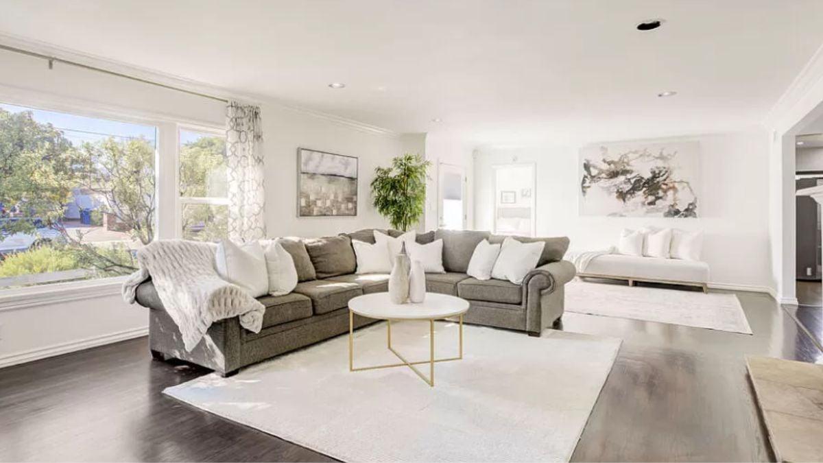 Light-Filled Lounge with a Comfy Sectional and Abstract Art