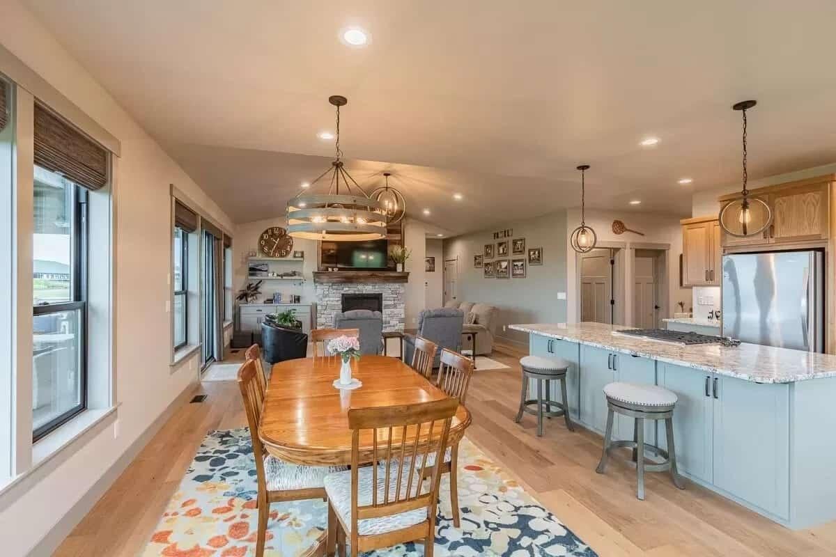 Open-Concept Dining and Living Space with Eye-Catching Light Fixtures