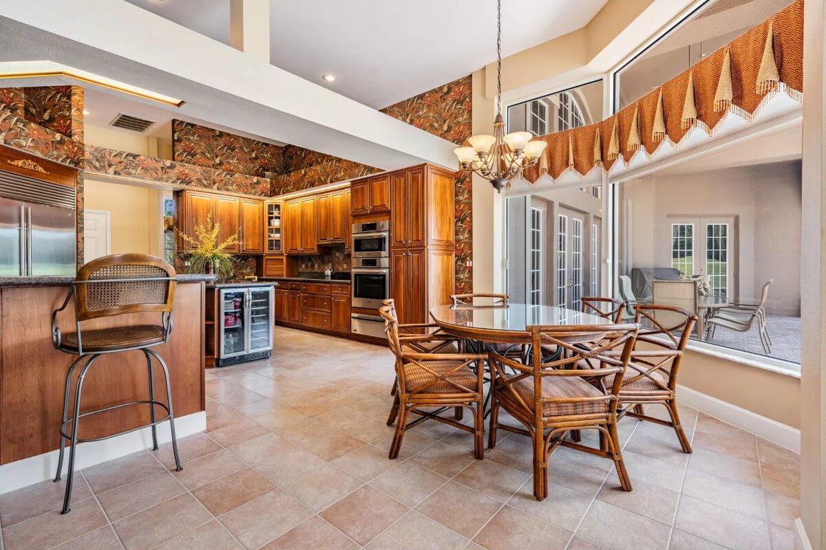 Cozy Kitchen with Bold Wallpaper and a Handy Breakfast Nook