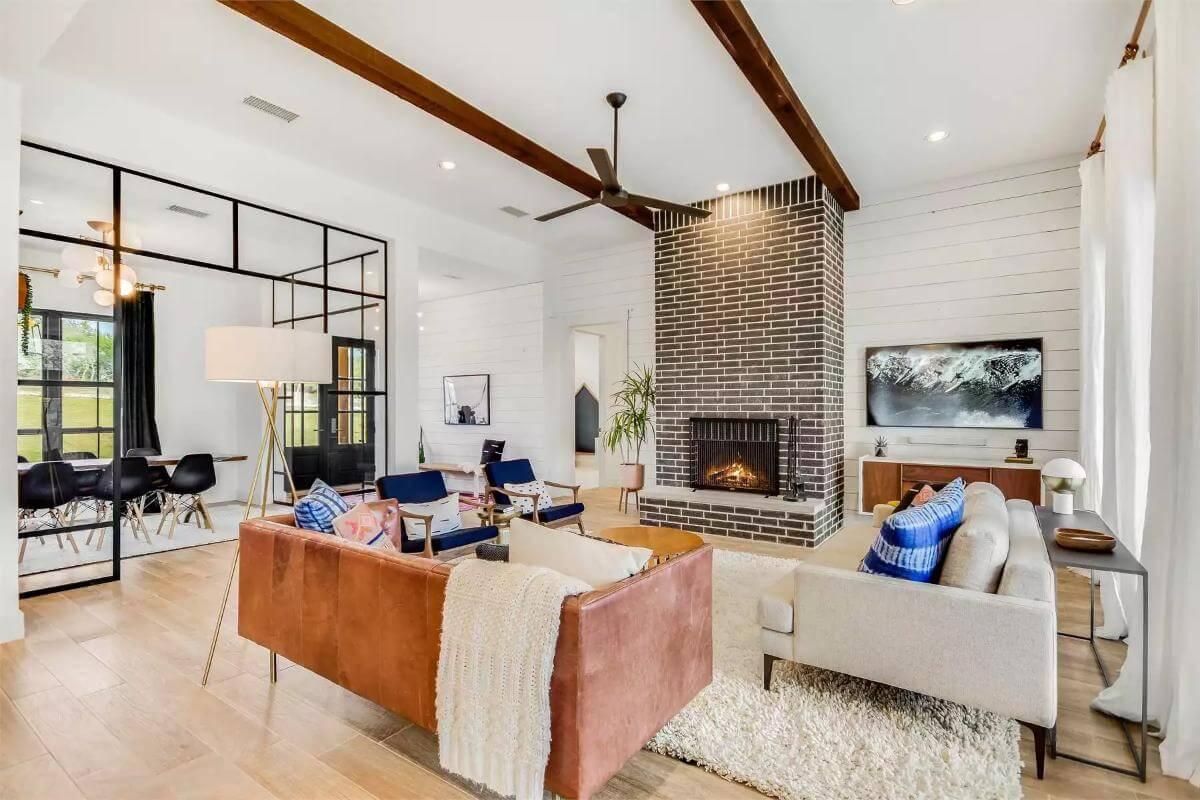 Check Out the Striking Brick Fireplace Anchoring This Living Room
