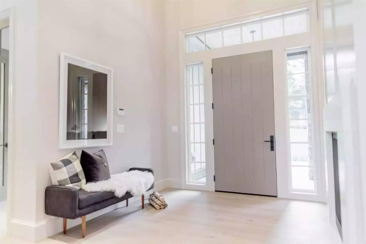 Check Out the Expansive Light-Filled Entryway with a Modern Touch