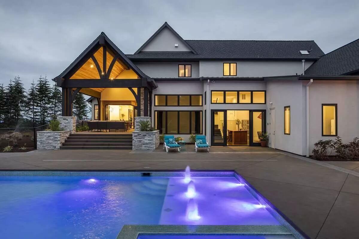 Explore the Striking Outdoor Covered Patio with Dramatic Wooden Beams