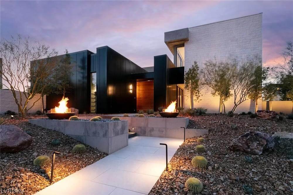 Wow, Look at the Dramatic Fire Bowls That Frame This Modern Facade