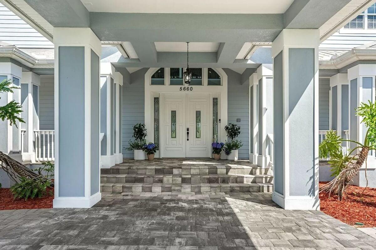 Symmetry Meets Style at This Inviting Entrance with Column Framing