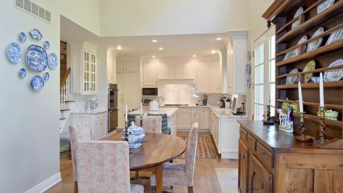 Notice the Charming Plate Wall in This Warm Kitchen Nook