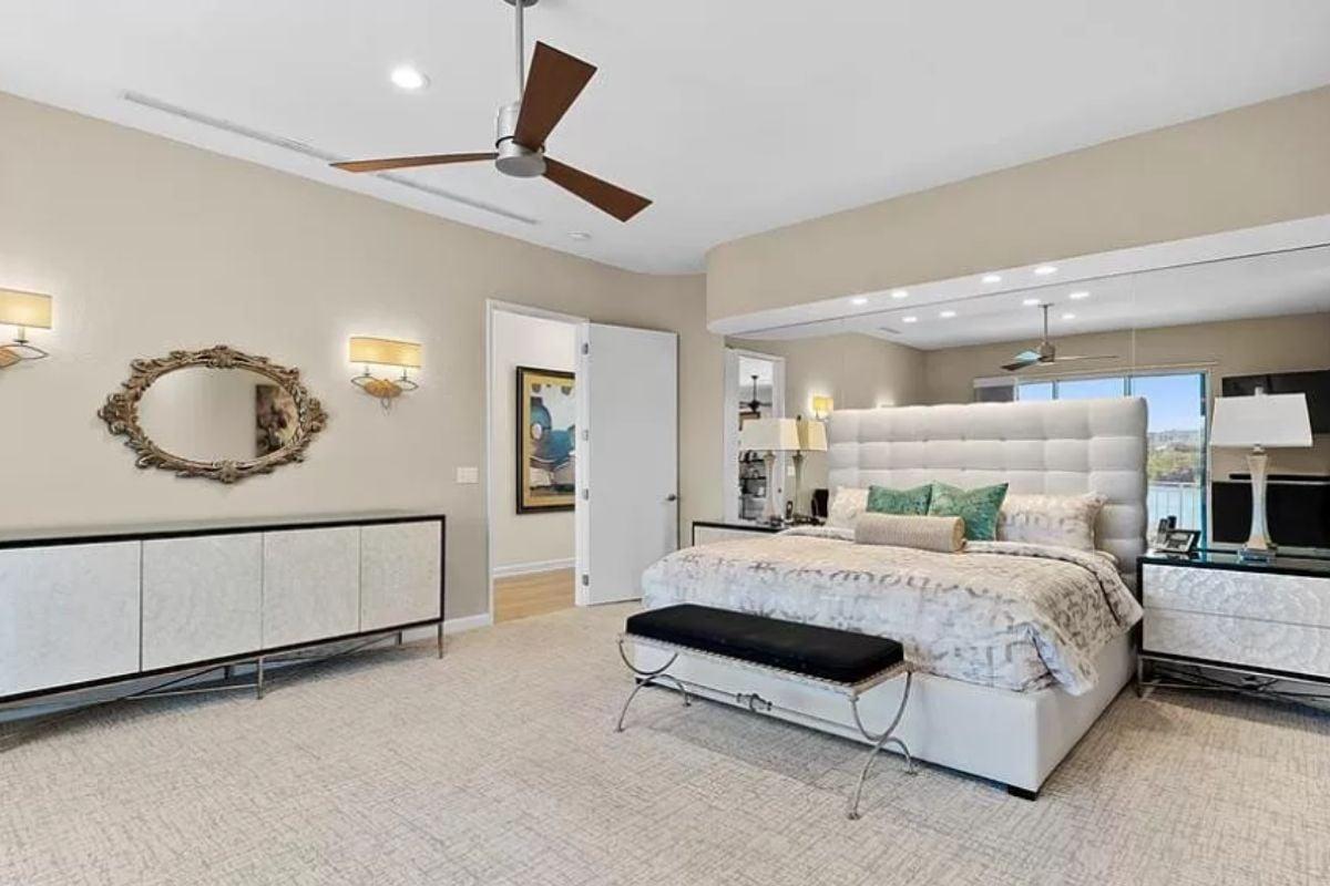 Gaze at the Sleek Ceiling Fan in This Stylish Bedroom