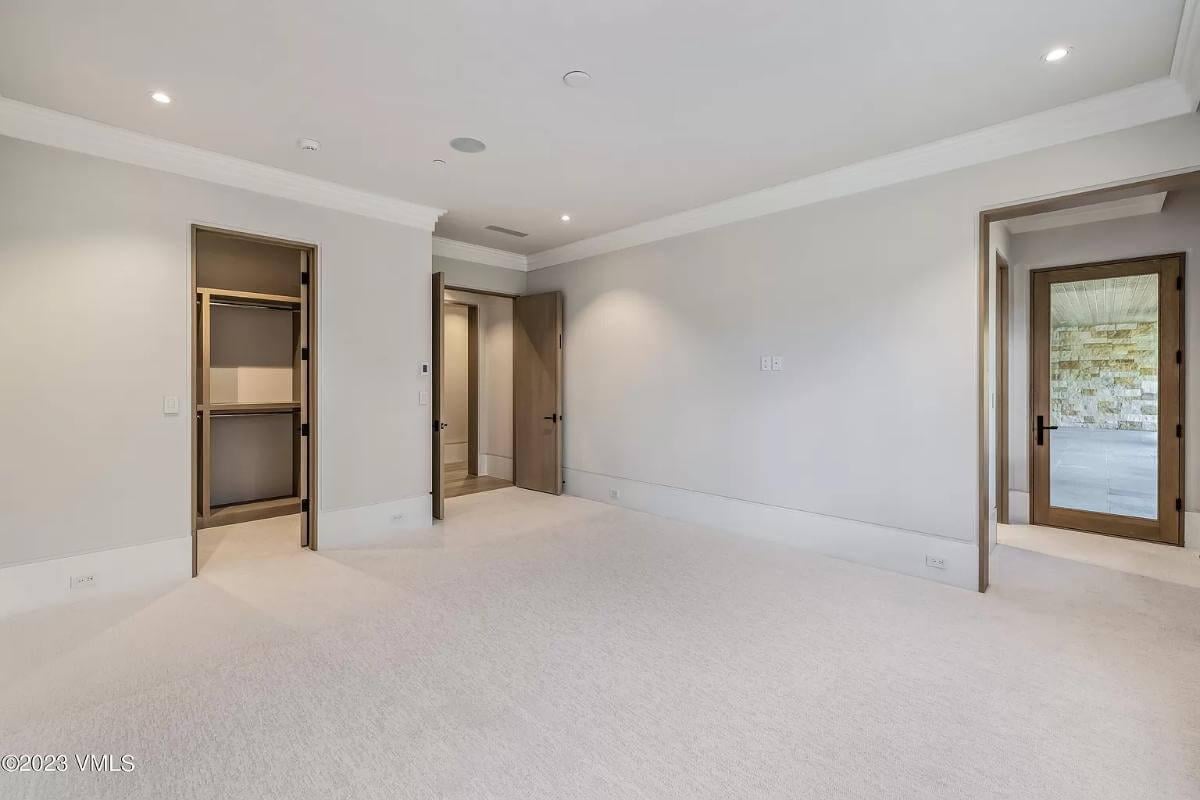 Spot the Elegant Wood Trim in This Minimalist Bedroom