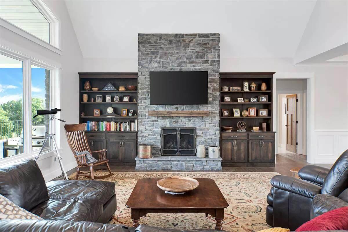 Admire That Stone Fireplace Flanked by Built-In Shelves in This Living Room