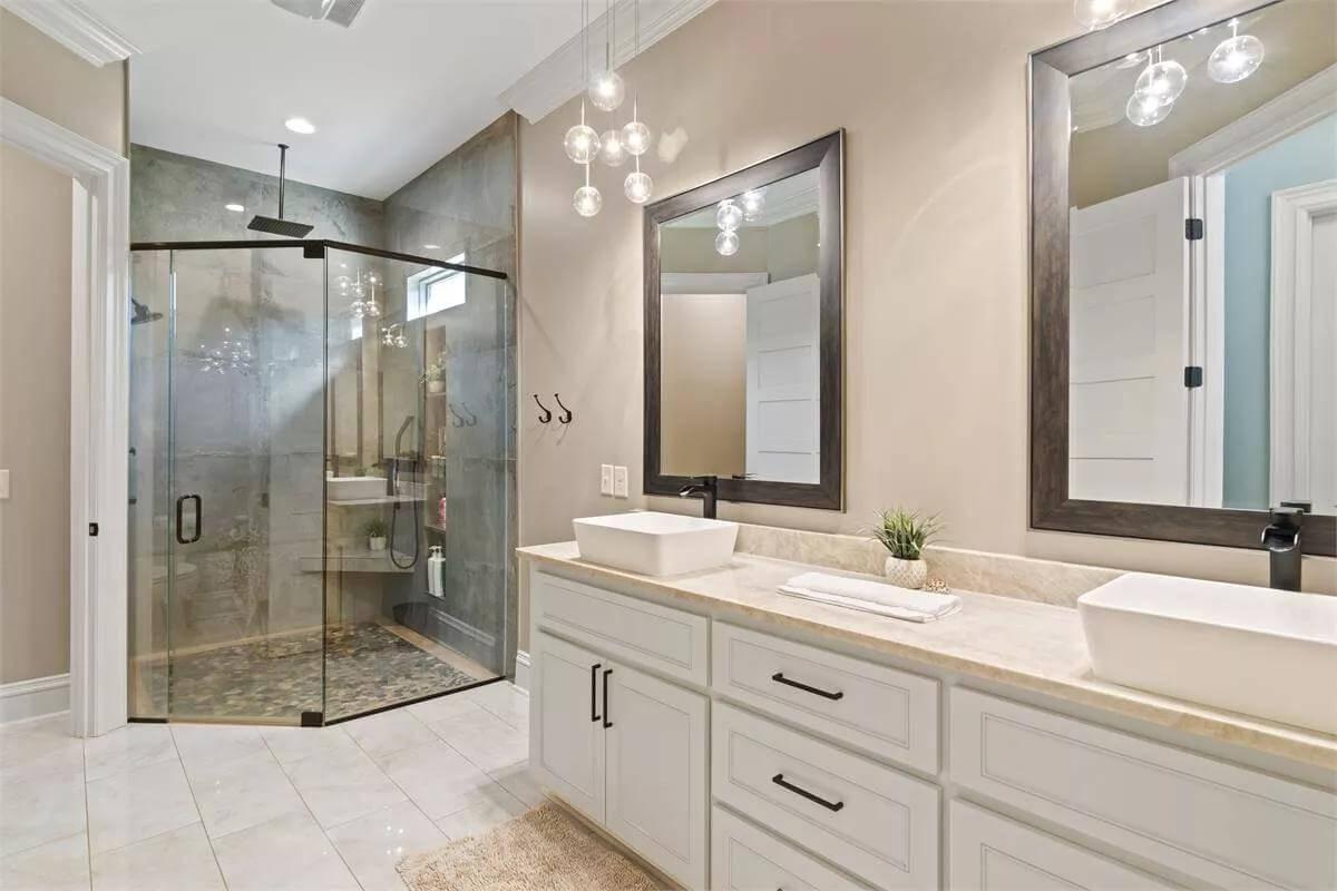 Spot the Floating Vanity with Vessel Sinks in This Stylish Bathroom