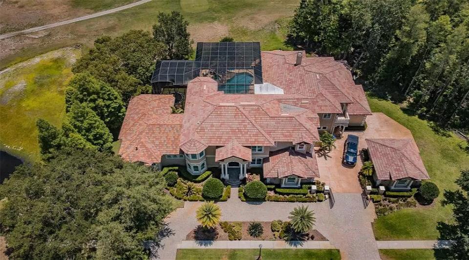Explore This Grand Estate with Terracotta Roof and Lush Surroundings