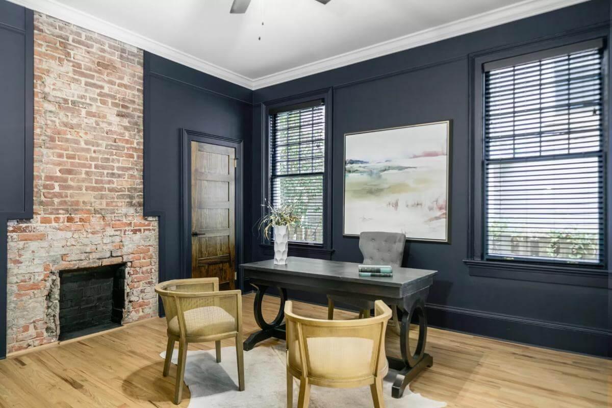 Check Out the Exposed Brick Adding Character to This Stylish Home Office
